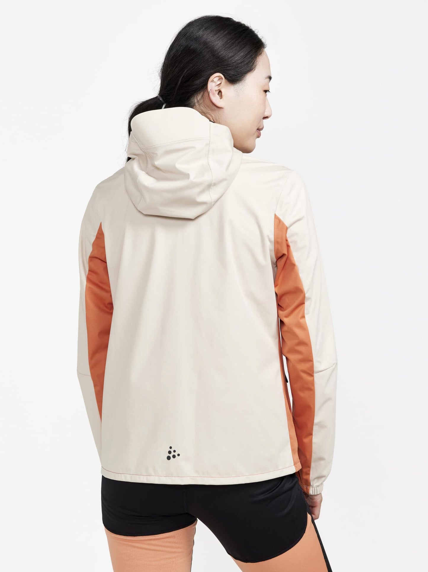 Women's ADV Essence Hydro Jacket - Rusty Glow/Ecru Craft Sportswear NA