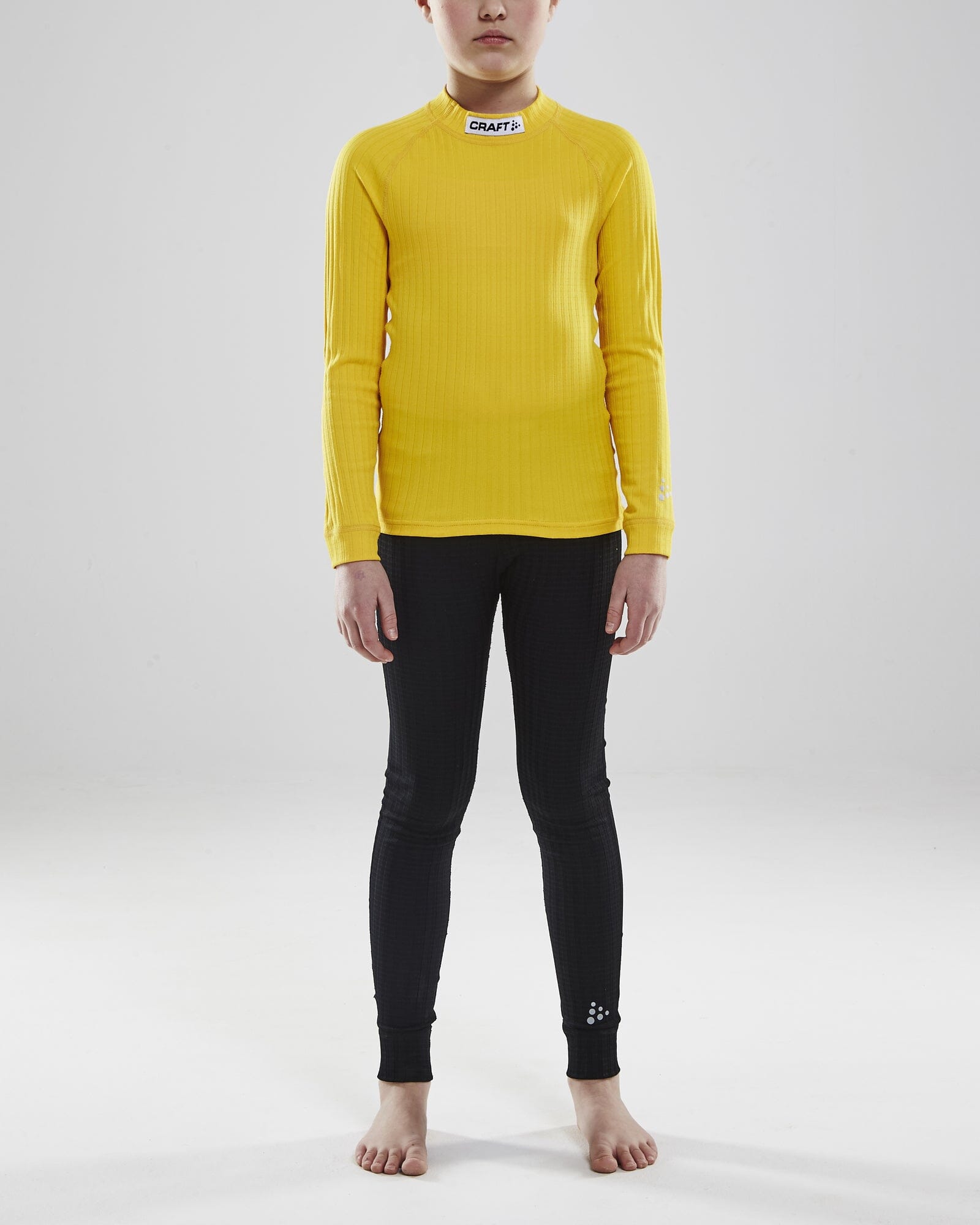 Junior Progress Baselayer CN LS - Sweden Yellow/Black Craft Sportswear NA