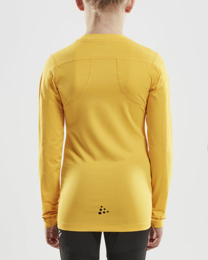 Junior Ability Compression Long Sleeve - Yellow Craft Sportswear NA