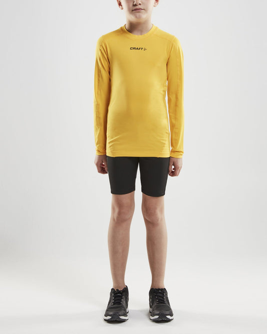 Junior Ability Compression Long Sleeve - Yellow Craft Sportswear NA