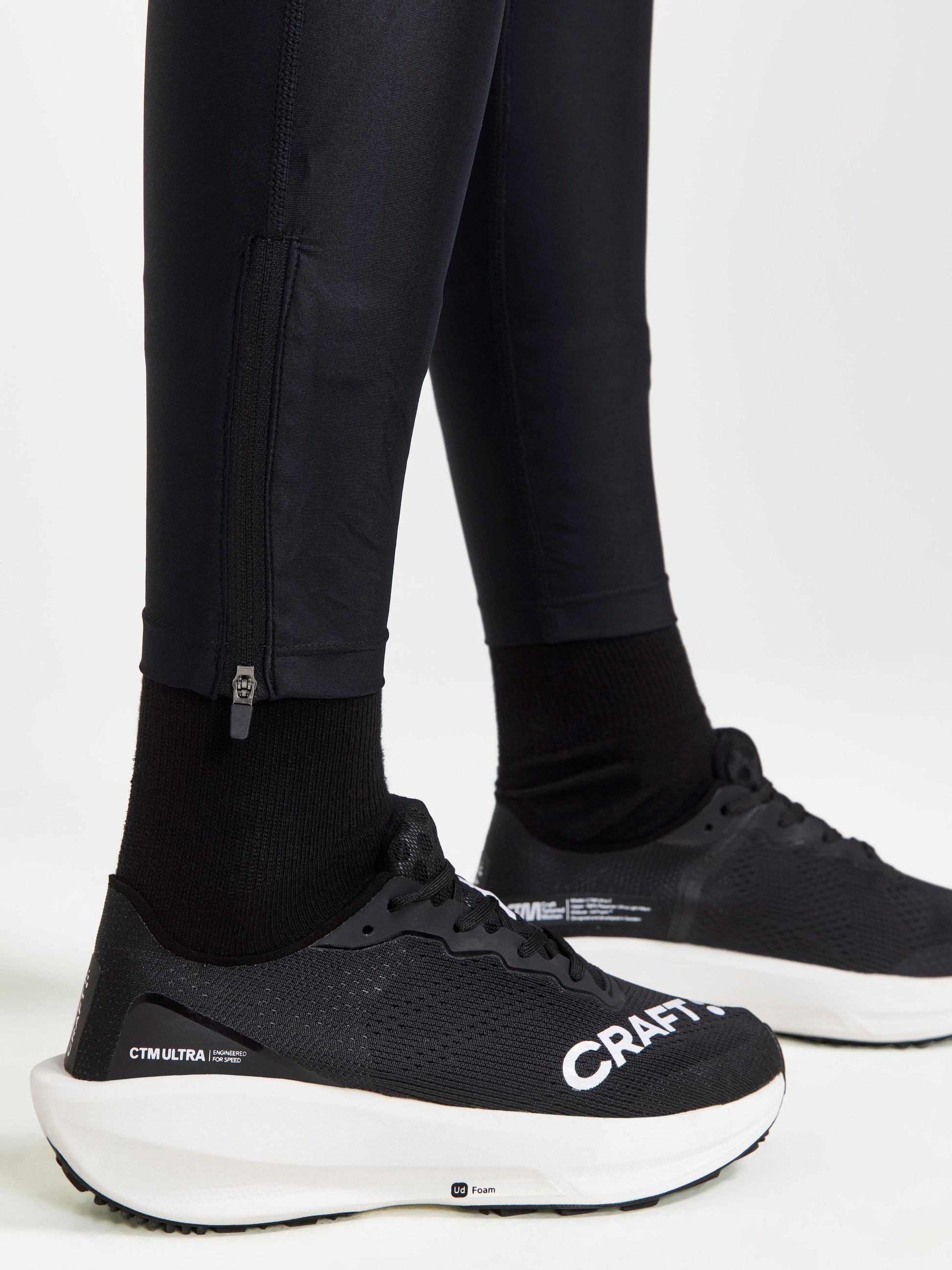 WOMEN'S ADV ESSENCE TRAINING ZIP TIGHTS - Black Craft Sportswear NA