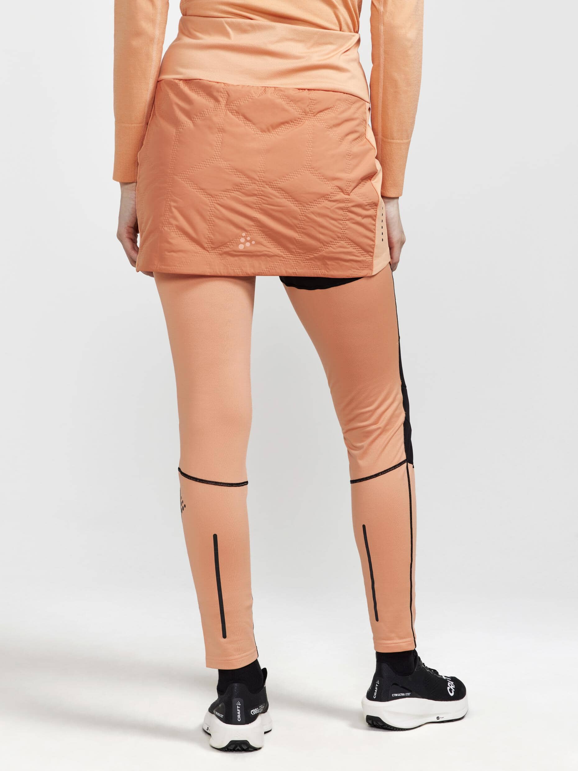 WOMEN'S ADV SUBZ RUNNING SKIRT 2 - RUSTY GLOW-GLOW Craft Sportswear NA