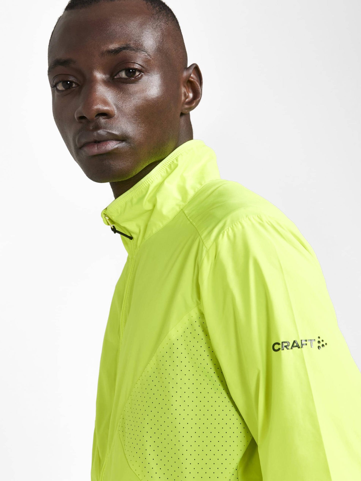 MEN'S ADV ESSENCE WIND JACKET - BIOME/BLAZE Craft Sportswear NA