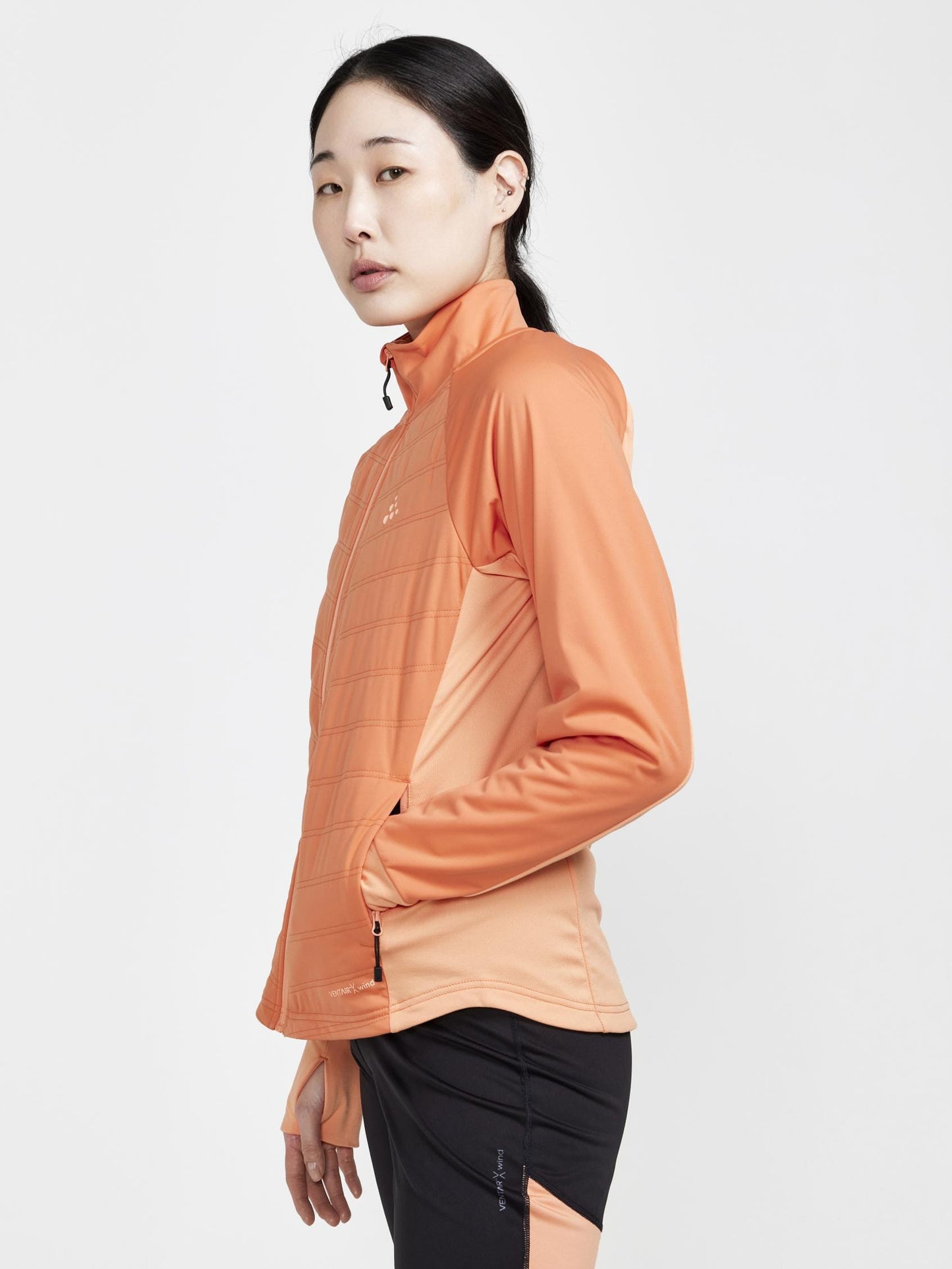 Women's ADV Essence Warm Jacket - GLOW-RUSTY GLOW Craft Sportswear NA