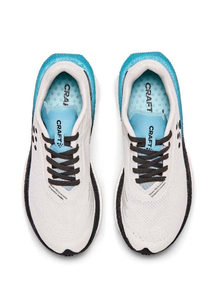 (取寄) クラフト レディース プロ エンデュア ディスタンス ランニング シューズ Craft women PRO Endur Distance Running Shoes (For Women)  White-Aquamarine Women's Pro Endur Distance - White/Aquamarine – Craft Sportswear NA