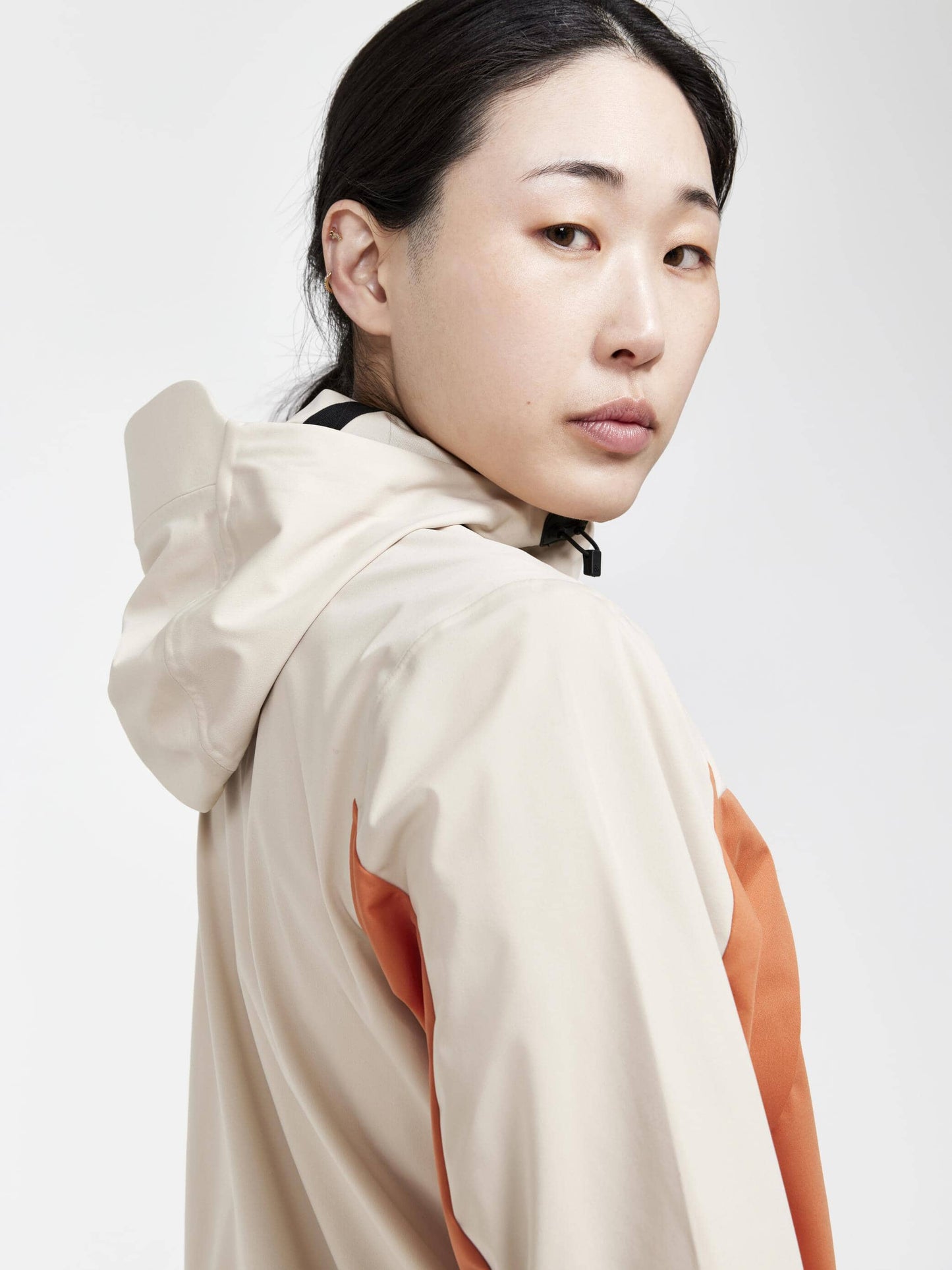 Women's ADV Essence Hydro Jacket - Rusty Glow/Ecru Craft Sportswear NA