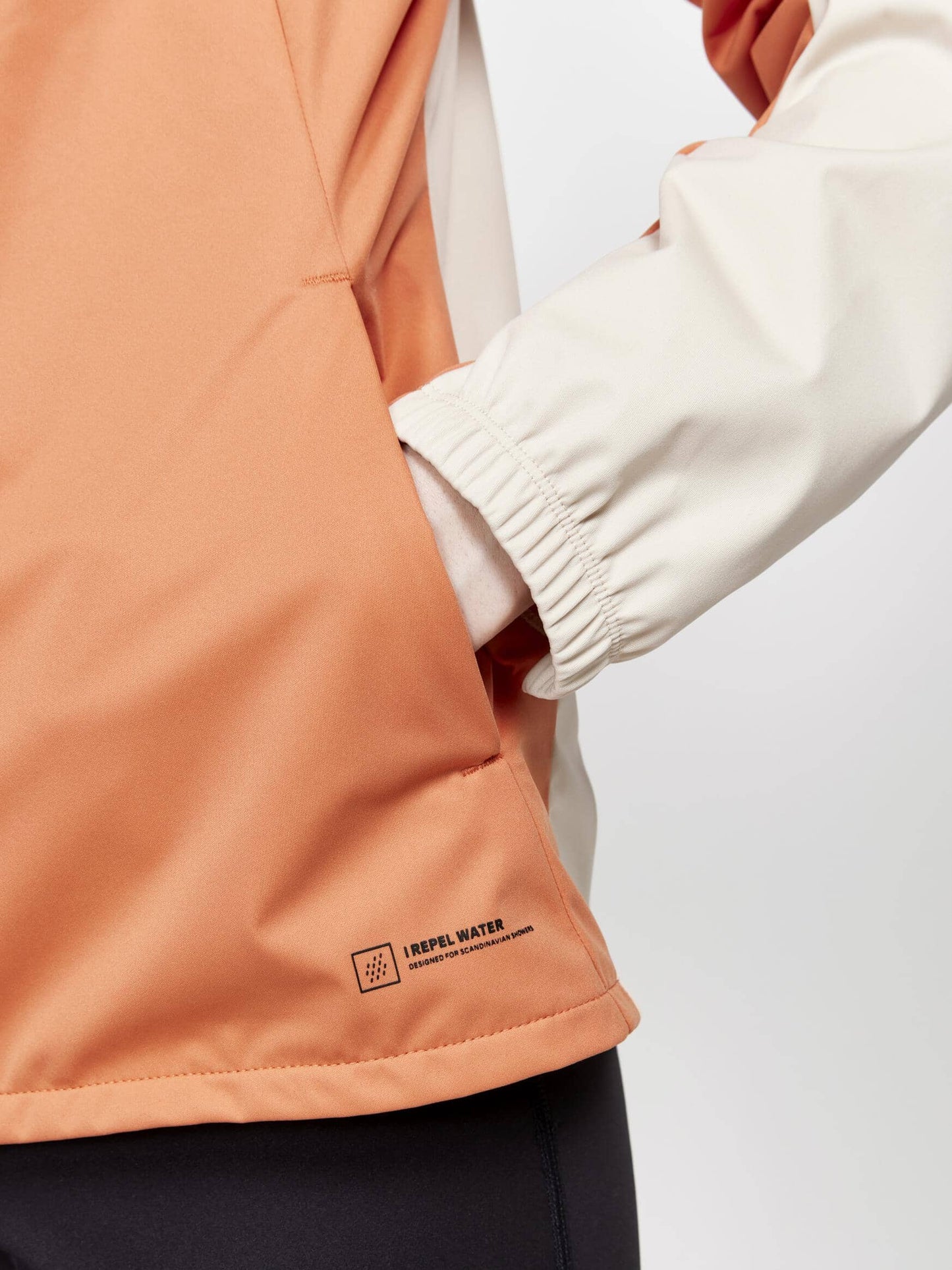 Women's ADV Essence Hydro Jacket - Rusty Glow/Ecru Craft Sportswear NA