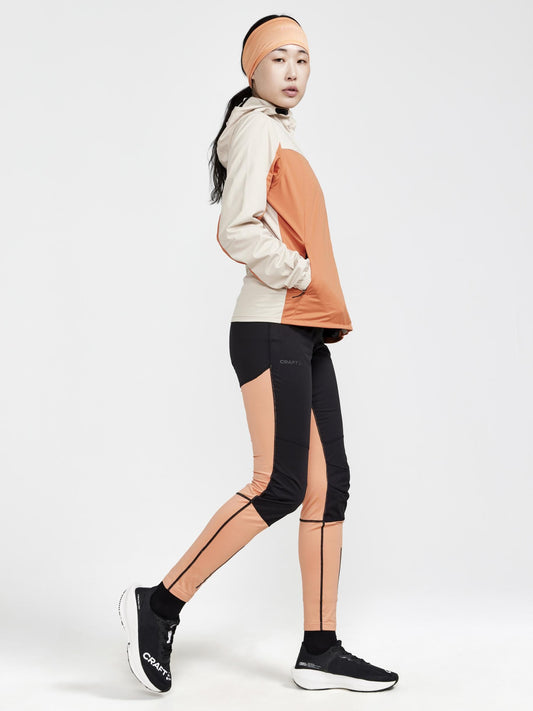 Women's ADV Essence Hydro Jacket - Rusty Glow/Ecru Craft Sportswear NA