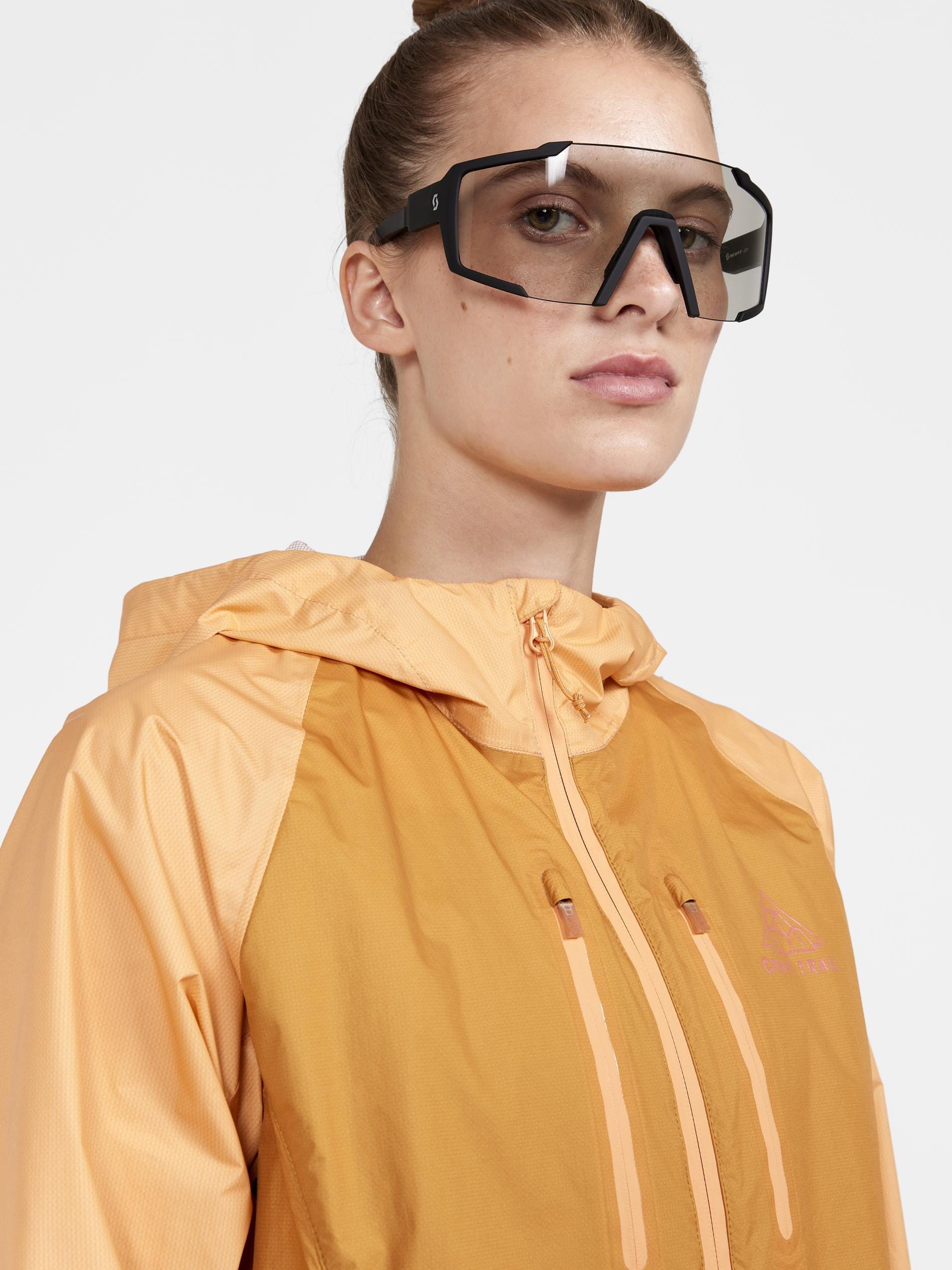 WOMEN'S PRO TRAIL RUNNING LIGHT WEIGHT JACKET - PEACH-DESERT Craft Sportswear NA