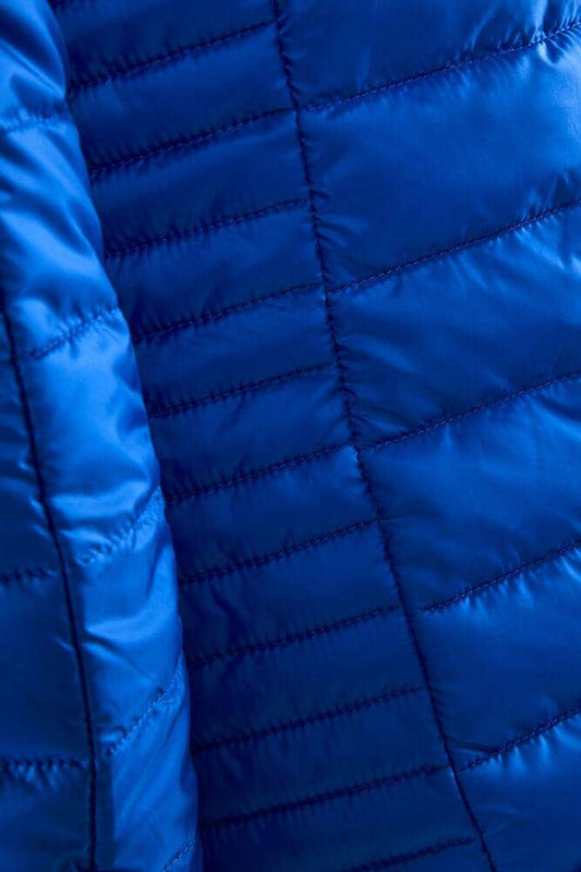 WOMEN'S CRAFT ISOLATE JACKET - ROYAL Craft Sportswear NA